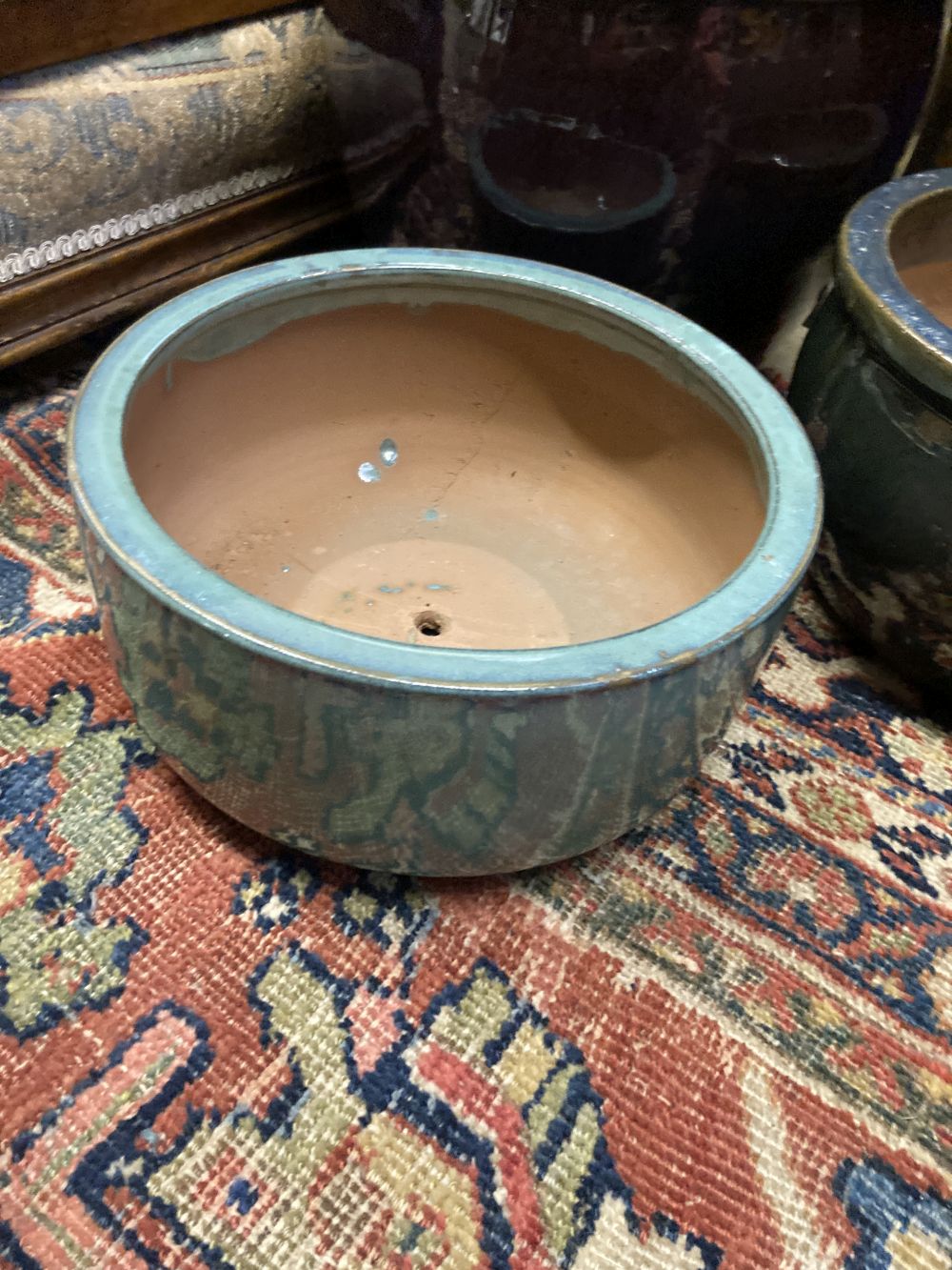 Four glazed earthenware garden planters, largest diameter 37cm